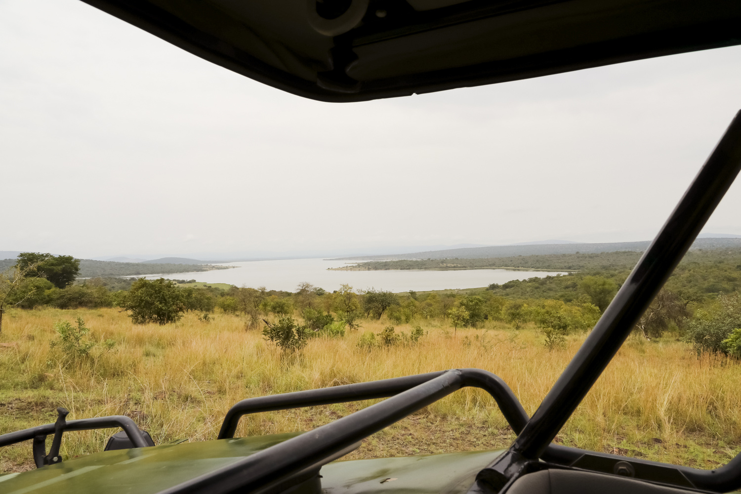 A safari vehicle on a game drive in Akagera National Park, Rwanda