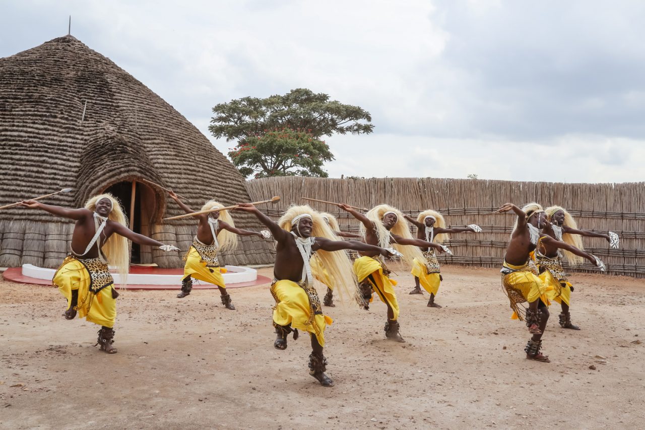 Rwandan Intore traditional dancers performing in ceremonial costumes